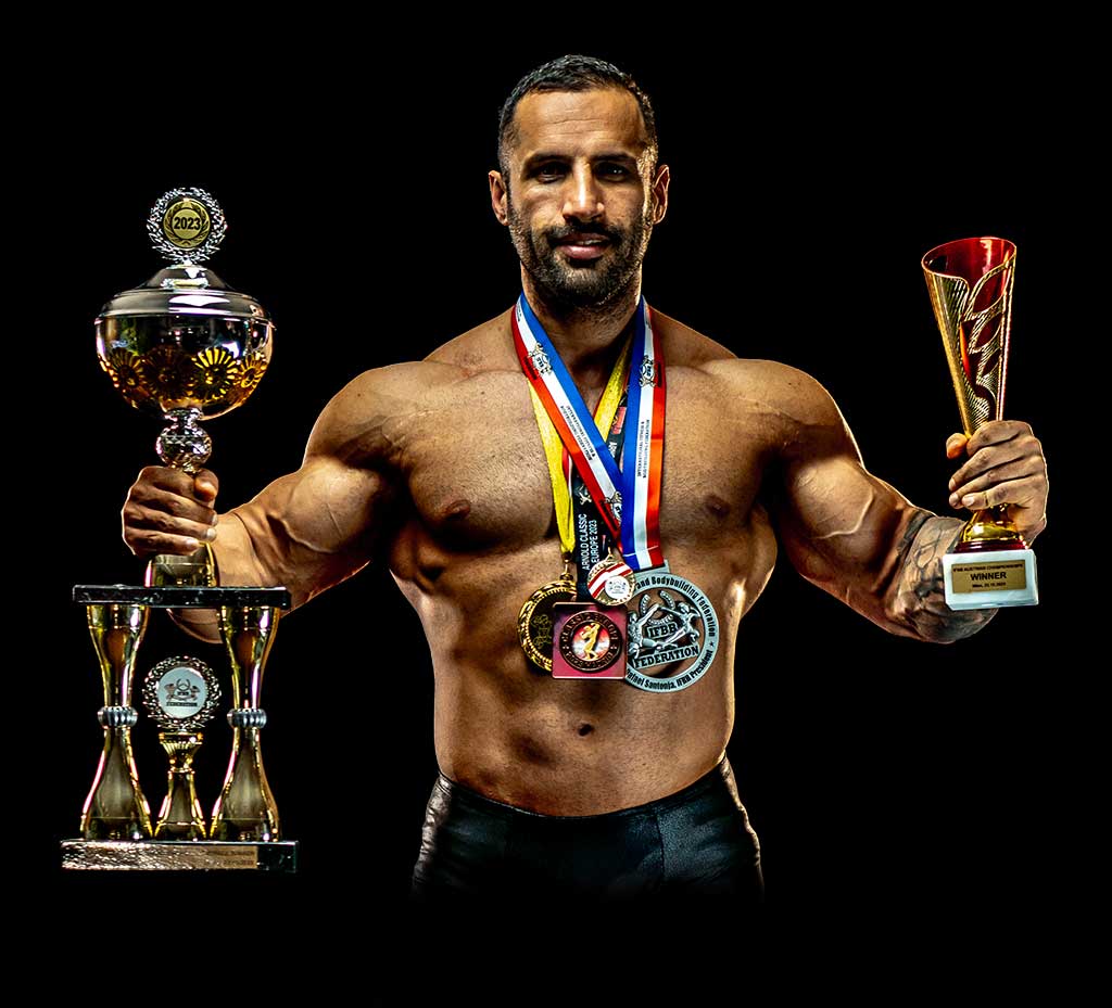 Najeeb Ander flexing his muscles